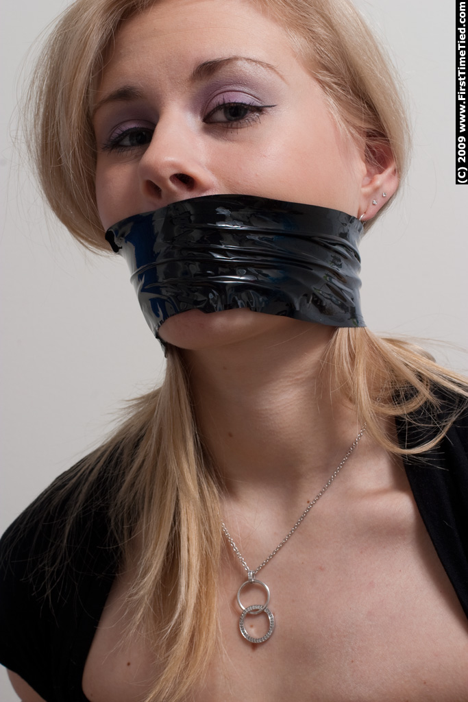 Donna black tape gagged - Unique Bondage - Pic 3