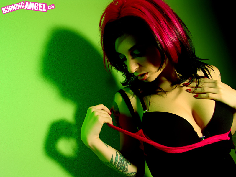 Joanna Angel strips in front of a green wal - XXX Dessert - Picture 1