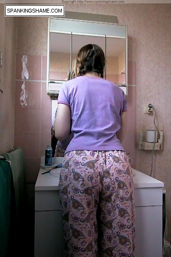 Lovely brunette teen in pijama gets spanked - XXX Dessert - Picture 1