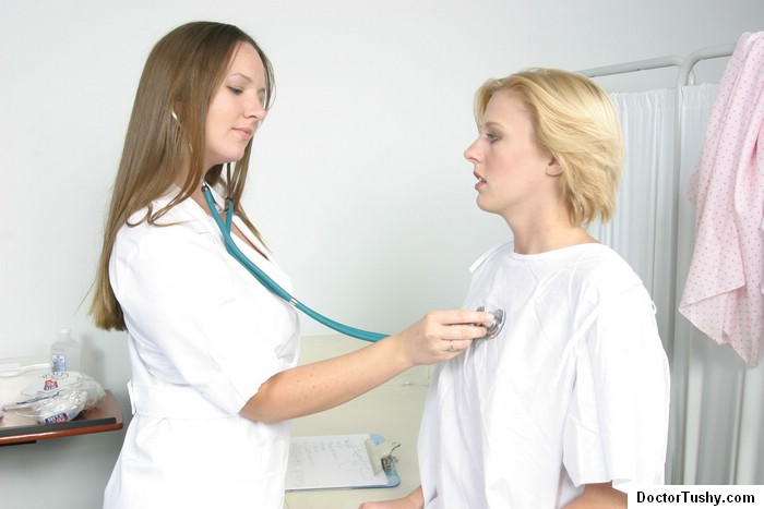Redhead nurse examines a hot naked girl - XXX Dessert - Picture 3