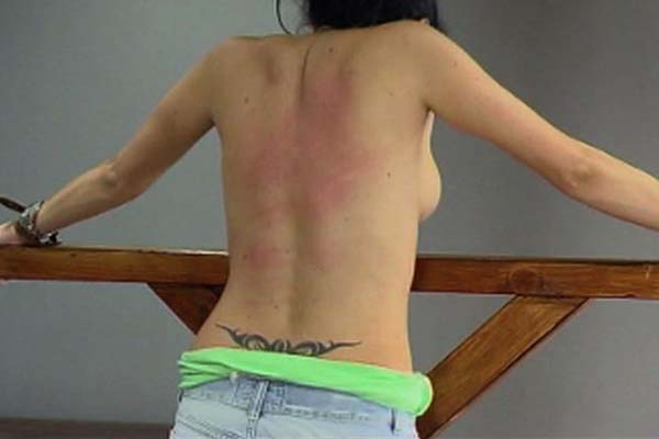 A woman is tied to the whipping post so she - Unique Bondage - Pic 10