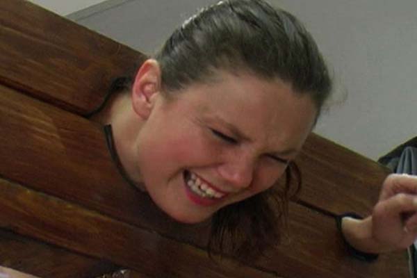 With her head and hands in the stocks, she - Unique Bondage - Pic 8