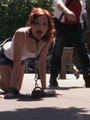 Public nudity. Beautiful redhead tied - Picture 1