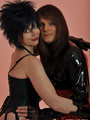 Spikey haired mistress posing with her - Picture 1