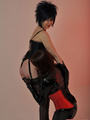 Spikey haired mistress posing with her - Picture 5