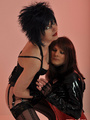 Spikey haired mistress posing with her - Picture 13