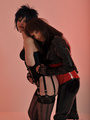 Spikey haired mistress posing with her - Picture 15