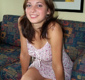 Lusty Mika on her bed just in black tube dress and nylons. She spreads