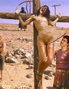 Bondage toons. Roman slave crucified and has her pussy whipped!