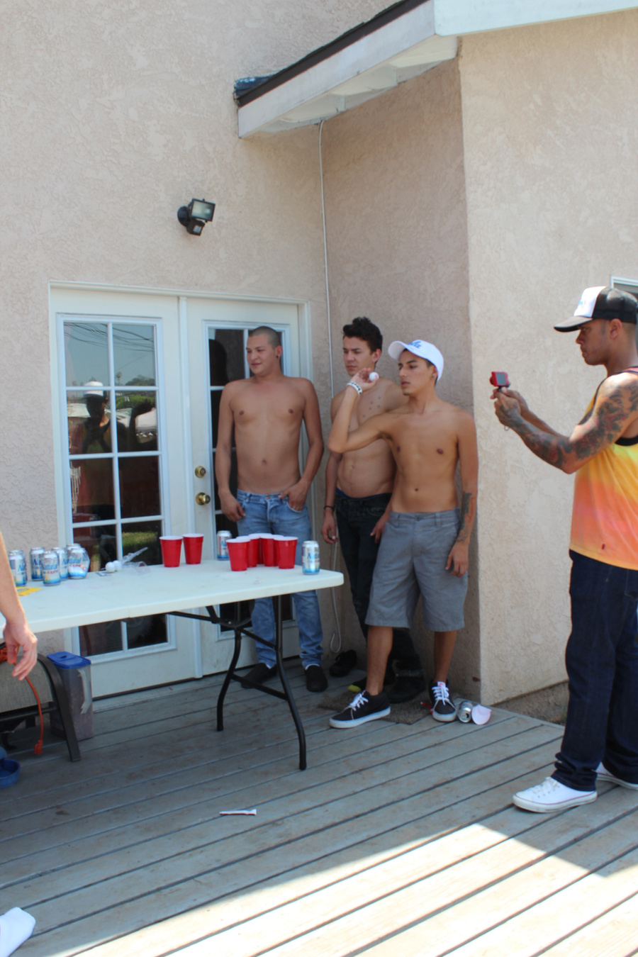 A group ot young guys unressing outdoors an - XXX Dessert - Picture 2