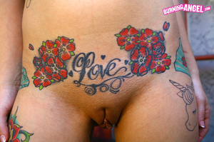 Cali Nova strips and shows off her tatto - Picture 13