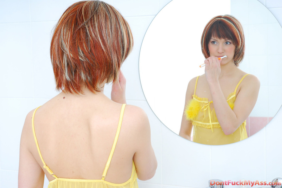 Sexy teen preparing for morning anal with a toothbrush stuck up her ass - XXXonXXX - Pic 1