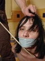 Tied up dark haired beauty get her naked - Picture 3