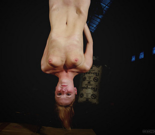 Suspended upside down blonde girl gets her - Unique Bondage - Pic 1
