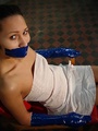 Tape bondaged babe in sexy tight thongs - Picture 1