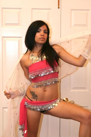 Petite Indian Ashawri sits on a huge dic - Picture 3