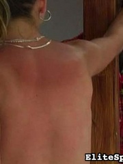 Reddened and painful, her back shows the - Unique Bondage - Pic 3
