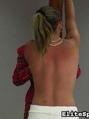 Reddened and painful, her back shows the - Unique Bondage - Pic 4