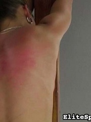 Reddened and painful, her back shows the - Unique Bondage - Pic 14