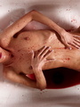 Tight teen pussy splashed with red wine - Picture 11