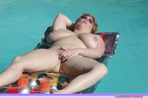 Hot redheads. Masturbating on the pool. - Picture 1