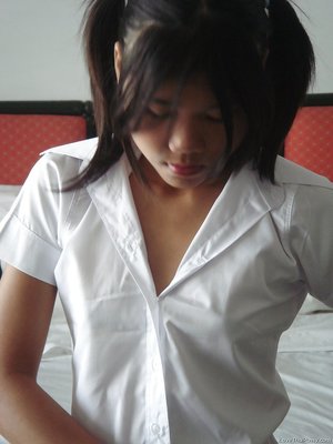 Stripping asian miniskirt