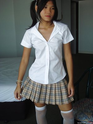 Stripping asian miniskirt