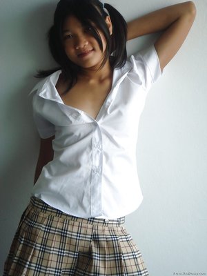 Stripping asian miniskirt