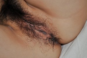 Hairy pussy fingering close up