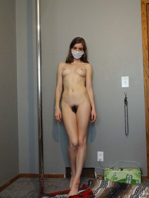 Masked girl protects herself with Corona mask