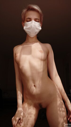 sexy Russian poses naked in medical mask