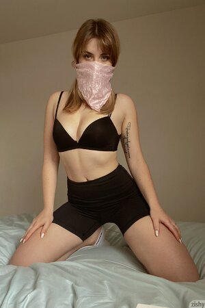 Topless teen tart posing in medical mask
