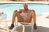 teen spreads legs poolside
