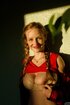 smiley teen shows tits