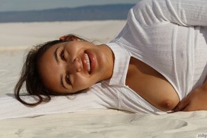 Cute teen's sexy shots in the sand