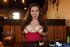 busty long-haired brunette shows