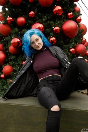 Tight blue-haired teen enjoys showing her perfect boobs