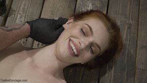 Radiant redhead's daunting BDSM session