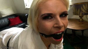 Mature blonde sub gagged by master's dick
