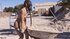 Small-titty brunette's pussy fingered outdoors