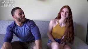 Adorable redhead doll is in the hands of a handsome hunk