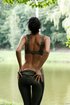 seductive young brunette poses