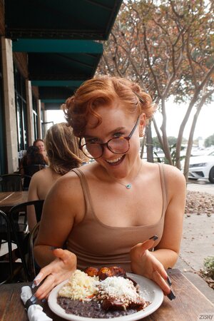 Sweet redhead smiles whenever she's teasing