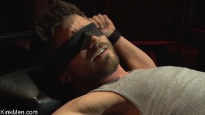 Restrained jock is teased with fire and hot wax