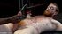 Ginger guy gets a hot wax treat from a handsome black man