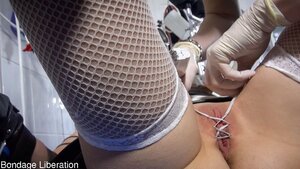 Kinky BDSM treatment for the female patient at a fetish clinic