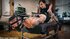 Tattooed gentleman is hogtied during femdom session