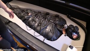 Gimp has his cock teased while restrained in a fetish bed