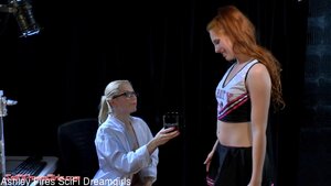 Redhead doll squirts milk all over the blonde scientist's face - Picture 3
