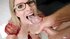 Nerdy MILF accepts semen with tongue out after being shagged
